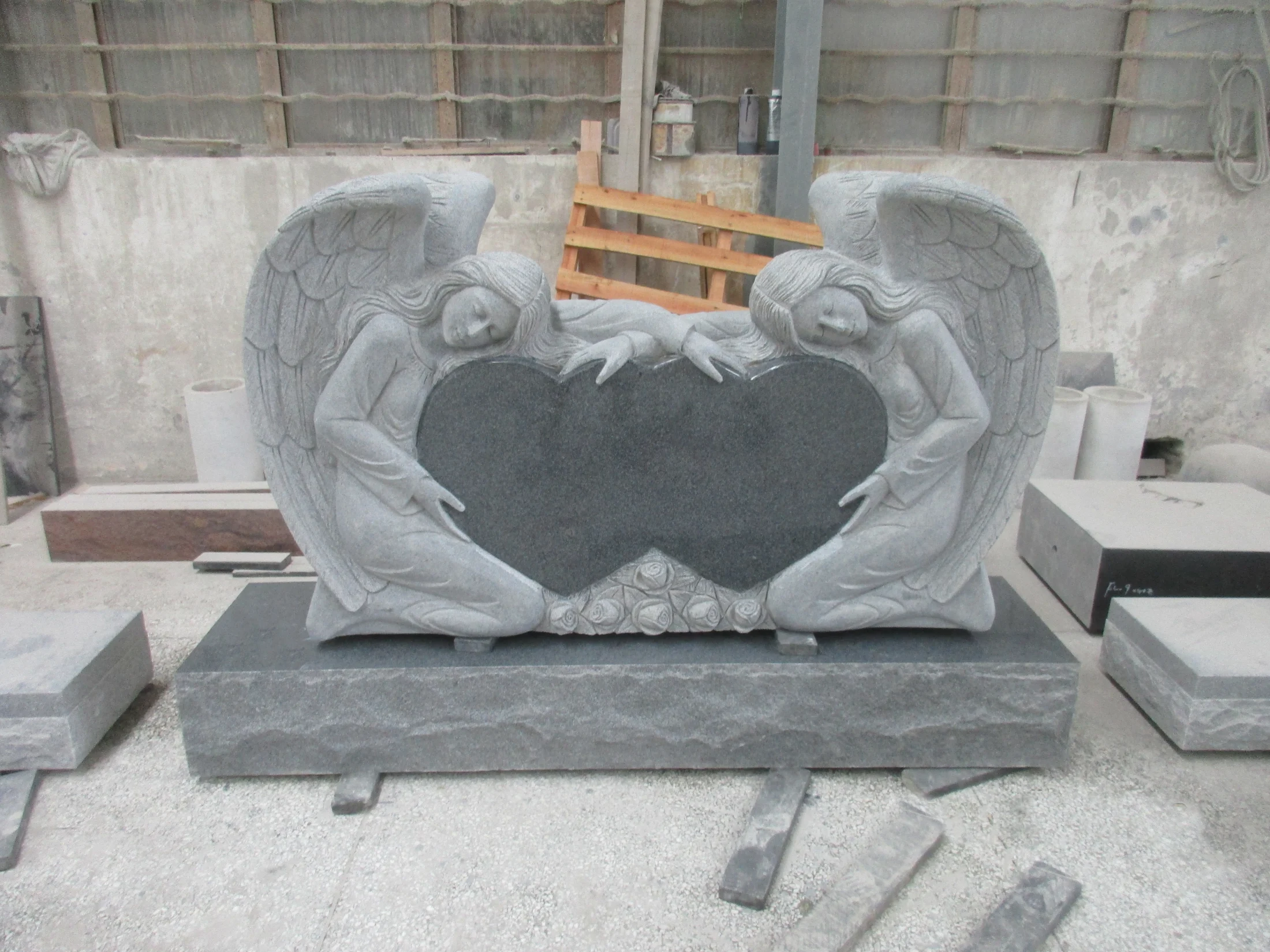 Double angels embrace the heart