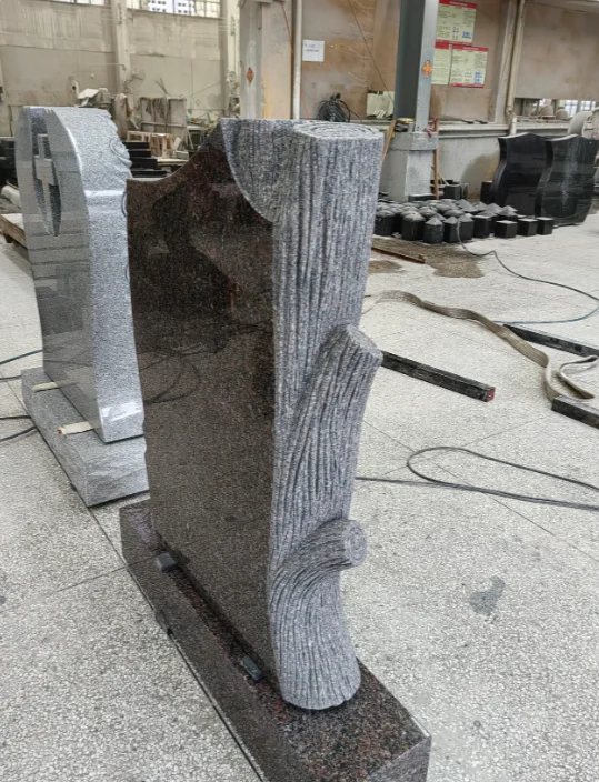 Polished Red Brown Granite Monument with Hand-Carved Tree Trunk & Leaf Relief